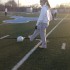 Junior Ashley Timme passes the ball to senior Addy Tabrizi while warming up on the second day of tryouts. "I'm really excited for this season," Timme said. "It's always exciting to meet the new faces and get back together to play with the old ones."