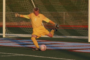 Andrew Engelmeyer kicks the ball away during the game against Ladue. "The Ladue game was a really good game, one of the two best moments of the season."