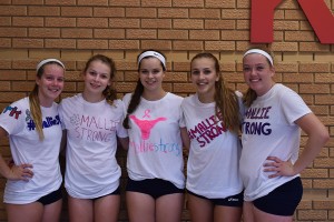 Varsity and JV girls volleyball made t-shirts saying "#MallieStrong" in support of Mallie Rover, a sophomore at Kirkwood High School battling stage four brain cancer.