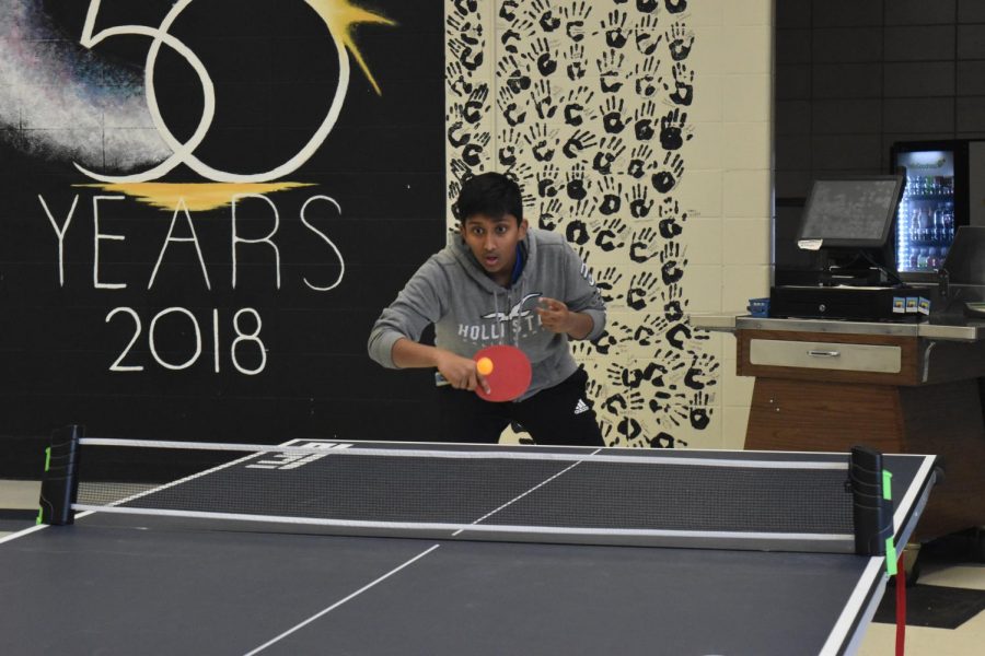 Freshman Rohan Daggubati engages in a ping pong match against junior Sri Jaladi. Daggubati has played ping pong for two years and with the Ping Pong Club every Tuesday. I get the chance to play, and I liked the tournament [we had], Daggubati said. [I like that] in the club everybody can play, even if you dont have a table at home.