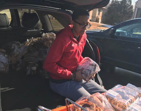 Sophomore Donnie Denham unloads a truck full of food for those in need. Denham was inspired to go out and make a difference in his community so he could feel that he was doing something that will impact others lives. “I love going out, spending my weekends away from friends, to go make someone else feel special,” Denham said. “I think sometimes we take for granted what we have in life. It doesn’t hurt to get out of your comfort zone to make someone else feel special.”