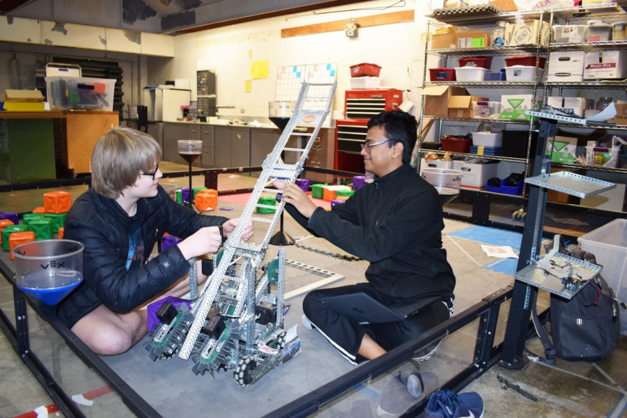 During Robotics Club, sophomores David Meisinger and Rick Biswas build a robot that they competed with in local competitions. Freshman Joseph Britt notes that cooperation was an important factor in the team qualifying for worlds. “Our team is mostly new people, so it is pretty exciting that we were able to work together,” Britt said. “I really like the environment there, and we have been spending a lot of our weekends working on the bot. We aren’t fighting over jobs or fighting over who gets to do what or [over] what the bot should do. We are all able to work together and execute it as a team.”