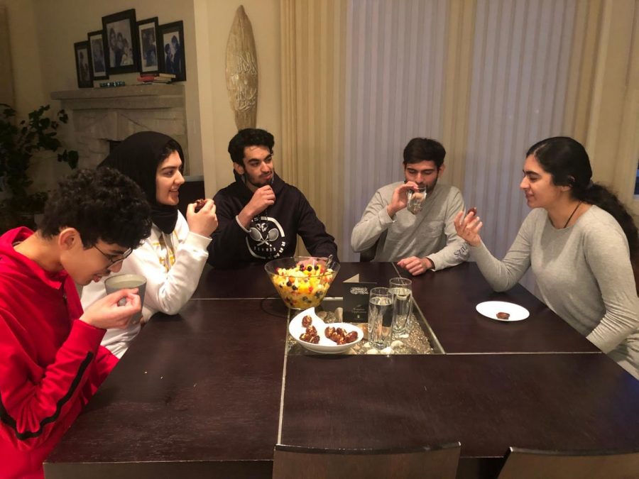 With iftar time arriving, junior Fatema Rehmani and her family gather to break their fast with dates and water, a tradition rooted in the religious teachings of Prophet Muhammad. 