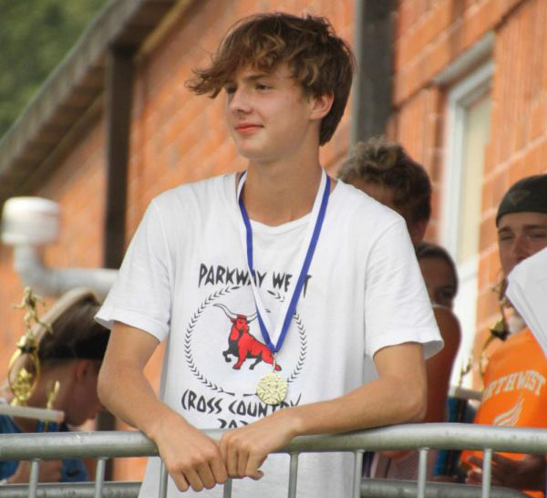 Freshman Brenden Porter relaxes after competing in the Stan Nelson Invitational Saturday, Sept. 11. “I was proud of myself for doing a good job. Also, [I have] respect for all the other [runners], because it’s definitely not an easy thing to do,” Porter said.