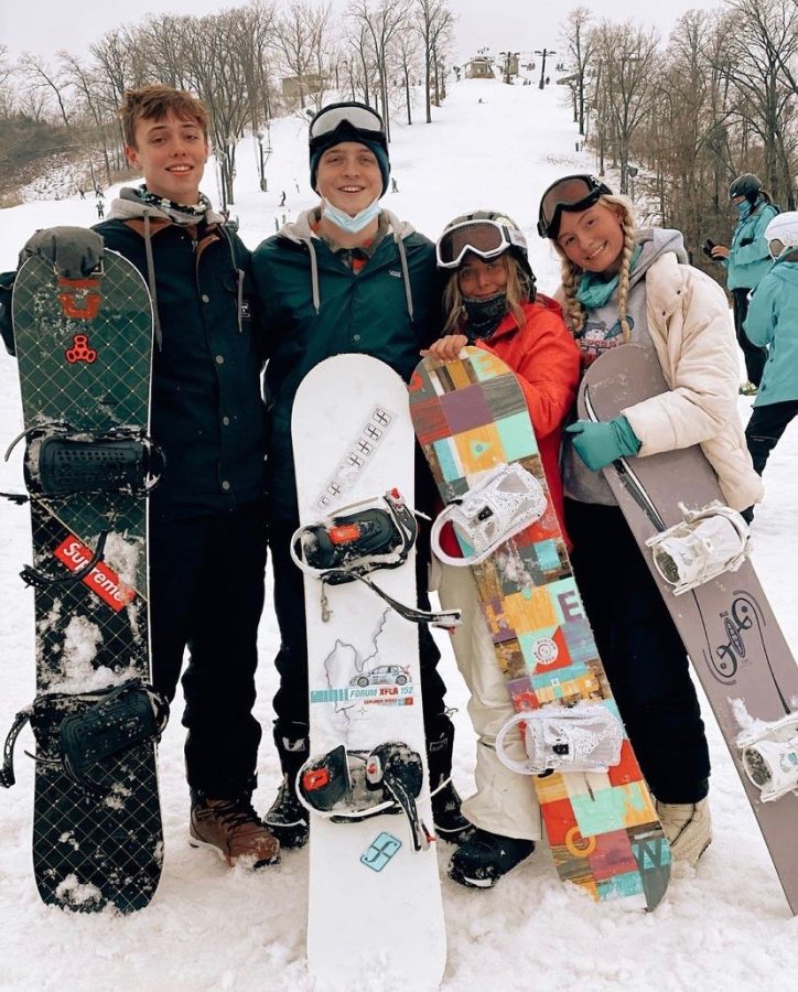 Senior Ashton Beattie poses with his friends at the end of the Show Me trail at Hidden Valley Ski Resort. “I actually hated [snowboarding] at first, but then once I started to do it a lot more and do it with my friends, I actually started to enjoy it. It stuck with me,” Beattie said.