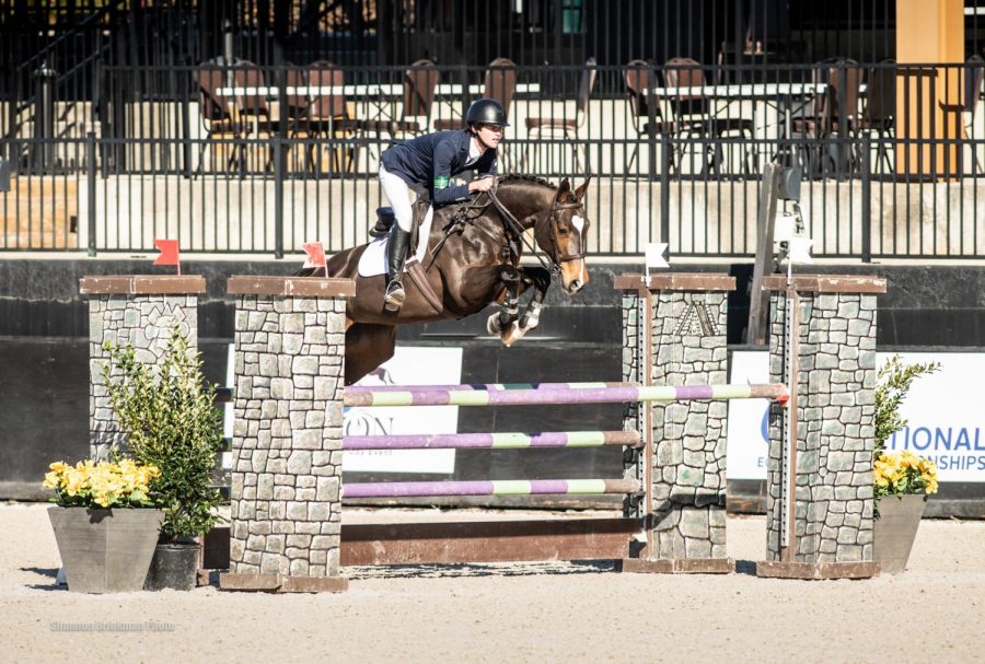 Senior+Ben+Noonan+rides+his+horse+Keep+Kitty+in+the+Tryon+International+CCI+competition.+Noonan+and+his+team+finished+first+and+Noonan+got+his+first+gold+medal+for+horseback+riding.+%E2%80%9CI+would+say+%5BI%E2%80%99m+best+at%5D+cross+country+%5Briding%5D+just+because+I+really+enjoy+the+adrenaline+of+it.+You+can+definitely+feel+the+high+speeds+and+just+its+really+a+fun+part+of+the+sport.+I+placed+individually+gold+and+my+team+placed+gold+as+well.+That+was+really+special+seeing+all+your+hard+work+come+through%2C%E2%80%9D+Noonan+said.