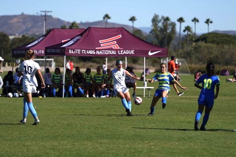 Center back Ava Relihan passes to her teammate during her showcase. Relihan traveled to California in hope of getting noticed by college recruiters. “My dad and I would say before games you never know whos watching, so I just go out there and play my best,” Relihan said.