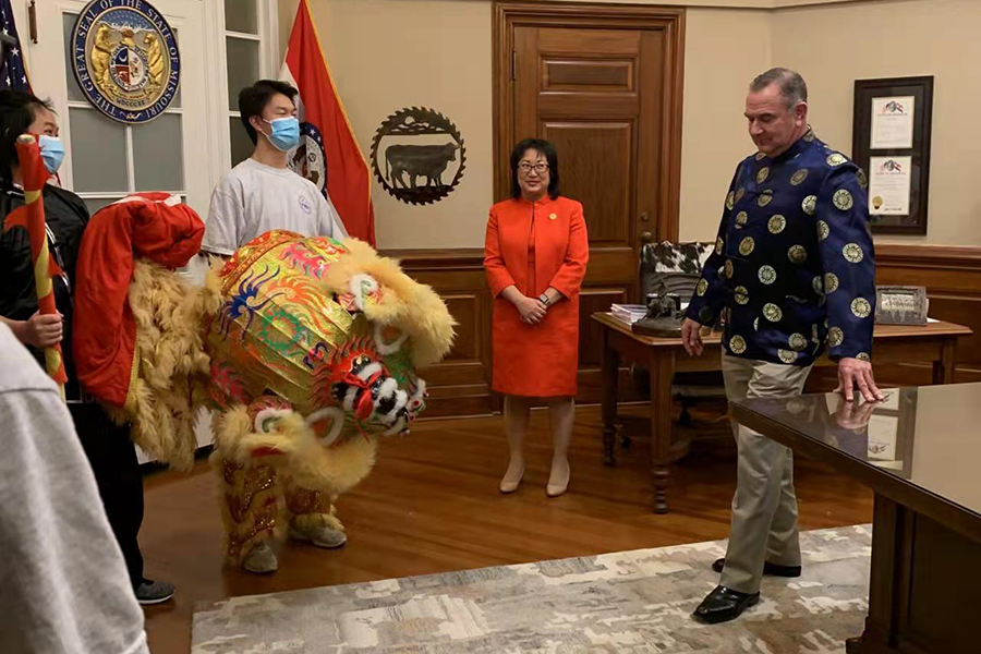 Junior Ryan Feng meets with Lieutenant Governor Mike Kehoe. Feng managed the head of the red and yellow lion when they performed. “Even with all the performances, fireworks, parades and shows, the best part of the Lunar New Year is family. Being able to just come together and eat good food, like dumplings or even hot pot,” Feng said.