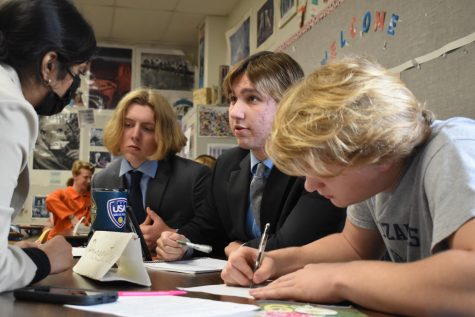 The prosecution team in the fifth hour Crime and Law mock trial plans for a cross-examination against a surprise witness during a two-minute recess. Senior Akshaya Mulakala, junior Jaxon Smith, senior Ryan Whorton and junior Parker Cummins gathered to come up with questions, hoping to discredit the witness and convince the jury that the defendant was guilty of second-degree murder. “I wanted to build a case by looking at [the] facts. [So,] it was cool to look at the details and build a case from that,” Whorton said. “The defendant [was] found guilty of manslaughter, but  got a 10-year [sentence] which I still consider a success.” 