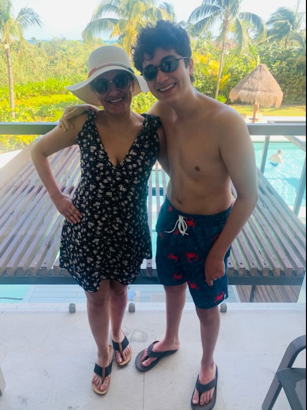 Freshman Jack Brau poses for a picture at the pool with his mom, while on vacation in Cancun, Mexico. Brau has learned a lot from his mom, from information on medicine to pacing himself in school. “[She’s taught me to] not let things get to me too much. Like if I get a B, its okay because I know theres going to be thousands more tests, theres always another chance for me to do better,” Brau said. 
