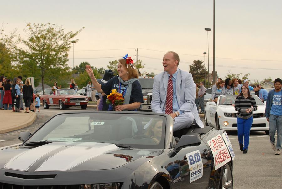 On Friday, September 14 Teacher of the Year Mary Ann McFarland and Principal Jeremy Mitchell lead the Homecoming Parade off the West High campus and through Brook Hill Subdivision