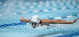 Freshman Gabby Vieira swims the 100-meter butterfly event, at the Central Municipal Pool in Cape Girardeau, MO. 