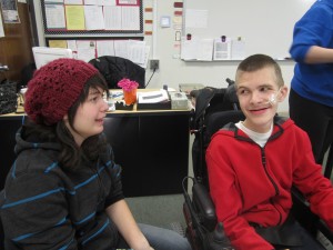 Beginning Journalism reporter Adam Selms interviews freshman Alex Clayton during class.