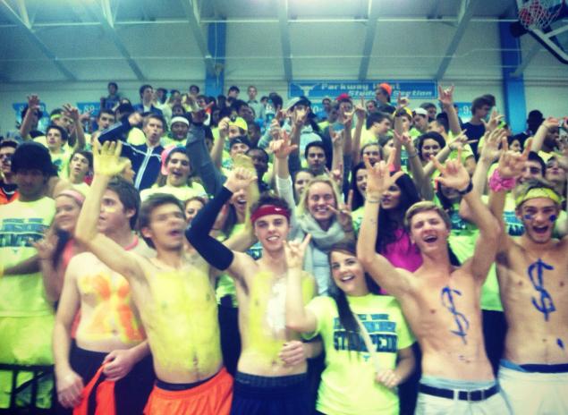 The Longhorn Stampede cheers on the team during Neon Night at the boys Basketball game against Parkway Central. We wanted to try and have as many themed nights as possible because were the best senior class to come through Parkway West, senior Kevin Doherty said. 
 