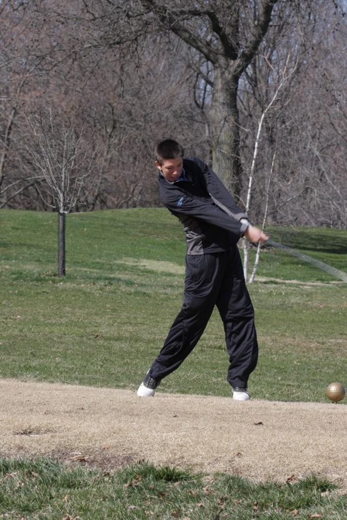 Sophomore TJ Teicher is taking a swing at golf practice. Boys golf has played in 11 tournaments and are playing on playing in 16 more throughout their season. “I think we will be competitive in our conference and challenge for the conference title,” Greg Schade said.
