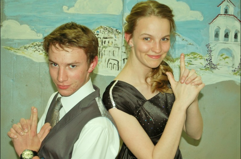 Siblings, senior Connor Black and sophomore Sydney Black, pose for a picture during Mormon prom. 