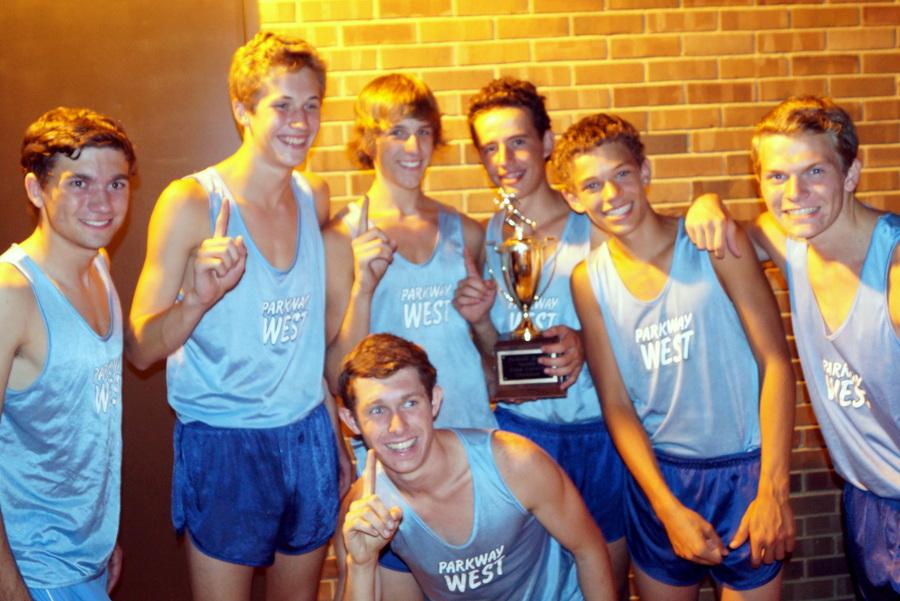 They boys cross country team poses after they won first place at the Parkway Quad. The team held a fundraiser for the Shoeman George Hutchings at the Quad, and the deadline to  donate shoes has been extended to Sept. 21 so that everyone can donate their used shoes. The Shoeman is a great cause because Africans are helped in two ways: they get shoes to wear, and they are given clean drinking water, assistant coach Kristen Witt said.