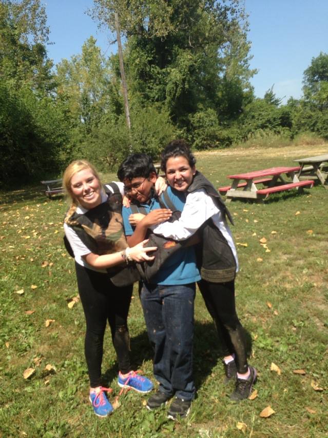 Seniors Noreen Webster and Yasmin Younis tackle freshman Aditya Buddi after their paintballing social. The team makes bonding experiences a priority so that everyone on the team gets to know each other well. The atmosphere of speech and debate is literally the greatest. The people are kind, social, and always there for each other, varsity debater Naomi Kodama said.