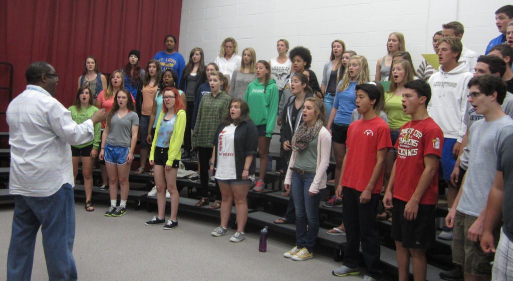 Eric Anthony conducts choir. “Choir is full of so many great things. It is a comfortable place for kids to express themselves and practice their leadership. Along with that, it helps boost self confidence when preforming in front of a crowd. We explore poetry, literature, history and different cultures,” Anthony said.
