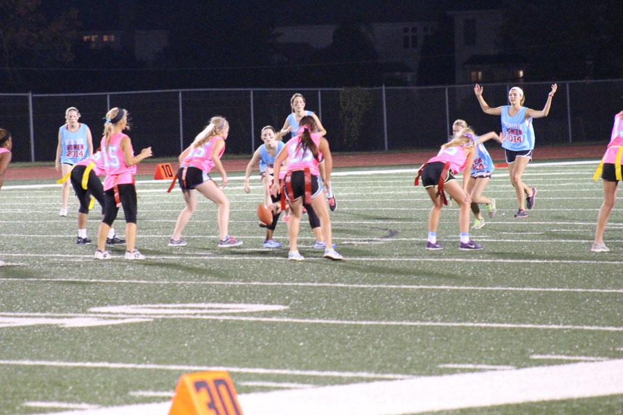 Junior girls take on the senior girls during the annual Powder Puff Game, and tied them with an ending score of 18-18.