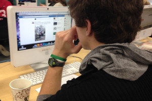 Sophomore Jacob Cupps taking a rare moment to check his Facebook news feed. I prefer Twitter and Tumblr over Facebook because I can be anybody I want to be on those sites. On Facebook its a lot of drama all the time, so its not as fun, he said. 