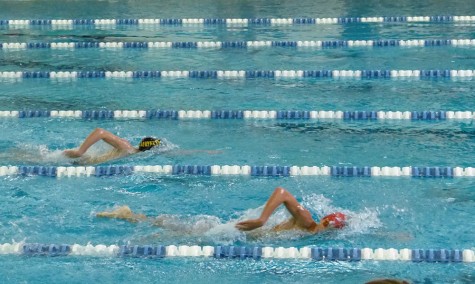 Junior Luke Christensen swims the 500 meter race at the Lafayette vs Parkway West meet at Lafayette at Sept. 3. Christensen won the race and qualified for state. “I was so happy. I worked really hard to get my goal by swimming fast at practice. I was ready to race the kid next to me who I knew was good at the 500 before the race began,” Christensen said.