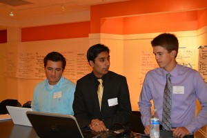 Jack Koury, Saad Sukhura, and Brett Darland all prepare for their pitches.