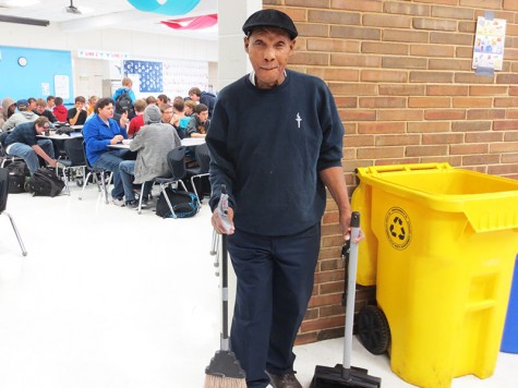 During second lunch, Custodial staff member Ollie Caruthers sweeps the floor. 