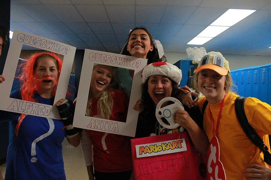 Seniors Claire Webster, Olivia DiCampo, Stefanie Elsperman, Ela Sutcu and Natalie Friese dress up for Toys and Games day.
