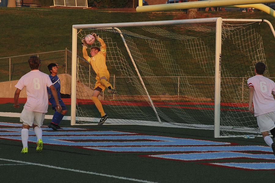 Sophomore goalkeeper Andrew Engelmeyer makes a save in the win against Ladue.