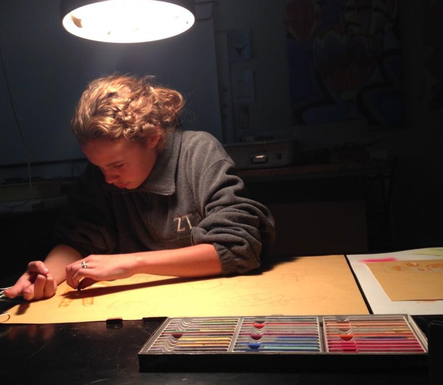 During her drawing class,  Sophomore Maggie Morse draws her hand. 