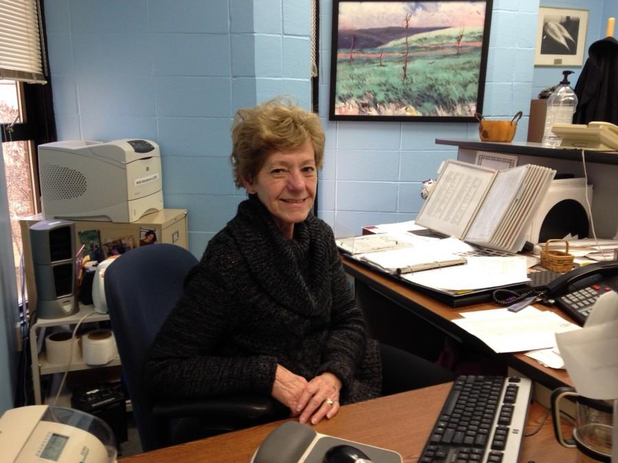 Attendance secretary Ann Lehman works diligently behind her desk. 