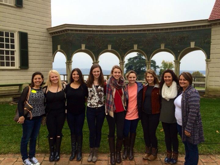 Standing in front of the George Washington Palace, Publications Adviser Debra Klevens, sophomore Ritoma Ganguly, junior Sarah OBeirne, junior Bailey Rathert, senior Kappy Pille, juniors Megan Barton and  Katie Hornsby and Photography teacher Katy Mangrich start off the city tour. “We ended up at Mount Vernon because our bus driver thought we were on a tour with another school but that was not the case,” Mangrich said. “It was fine that we ended up there. There are better places to visit in Washington, D.C.” 