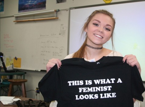 Junior Sidney Baker shows her support for the Feminist Club by purchasing a t-shirt that reads This is what a feminist looks like. Baker was recruited to the clubs executive staff as the Publicist, running the social media accounts.