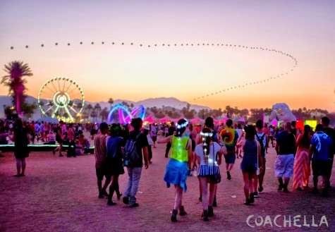 Spectators watch the sky at Coachella Music Festival.