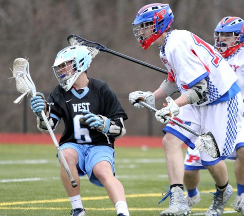 Senior Kyle Bernstein shakes off a defender against Priory on March 25. 