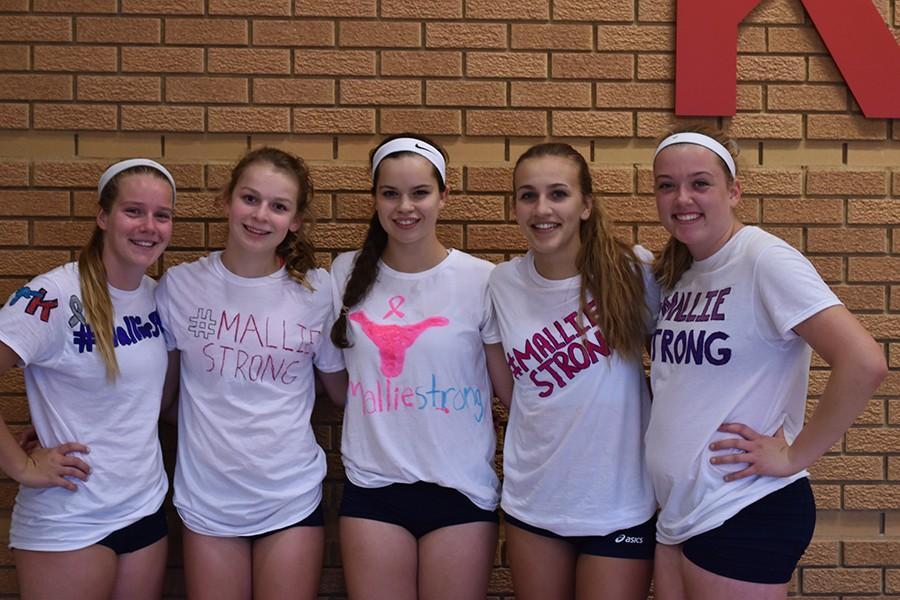 Varsity and JV girls volleyball made t-shirts saying #MallieStrong in support of Mallie Rover, a sophomore at Kirkwood High School battling stage four brain cancer.