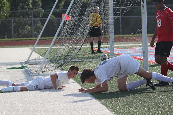 Junior Connor Basler and sophomore Jackson Swiney collid heads while attempting to score a corner kick in their game against West Plains on Aug. 21. After we both got up, the refs made me go sit on the bench, but kept Swiney out on the field becuase he was the bigger guy, Basler said.