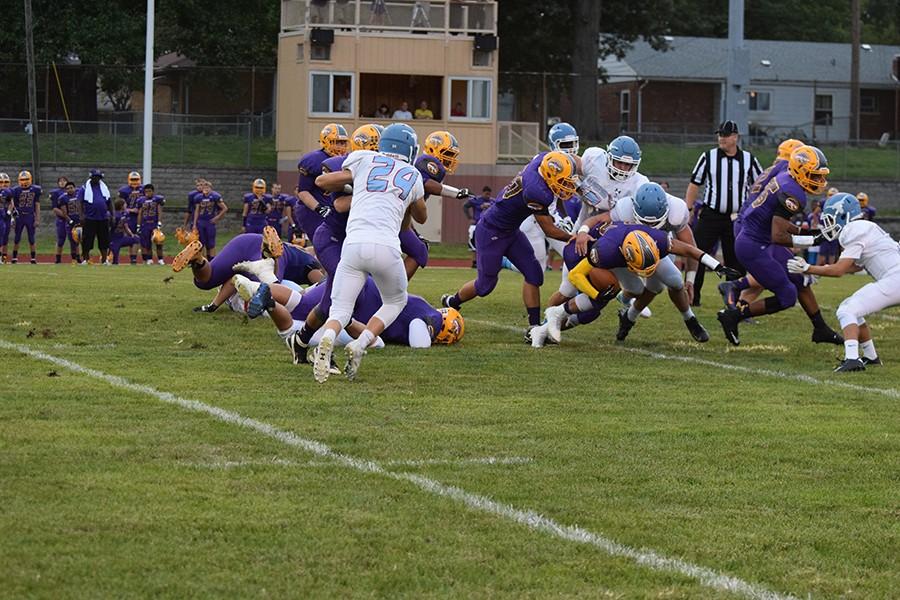 The Longhorn defense stops Afton during their game on Aug. 28.