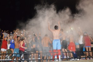 Baby powder was thrown in the air by the student section while chanting the "I Believe" cheer at the home football game Friday night against U City. -Haley Tiepelman (11)