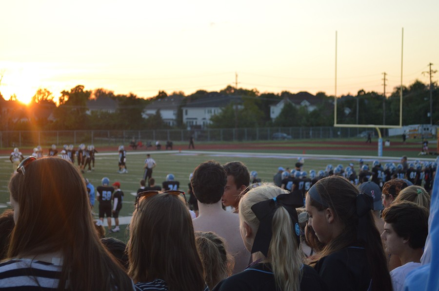 Varsity football fans attend the boys first home game against U. City on Sept. 11.