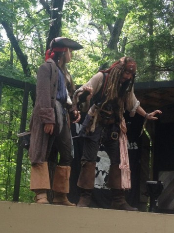 Spaulding in her Jack Sparrow costume standing next to another Jack Sparrow.