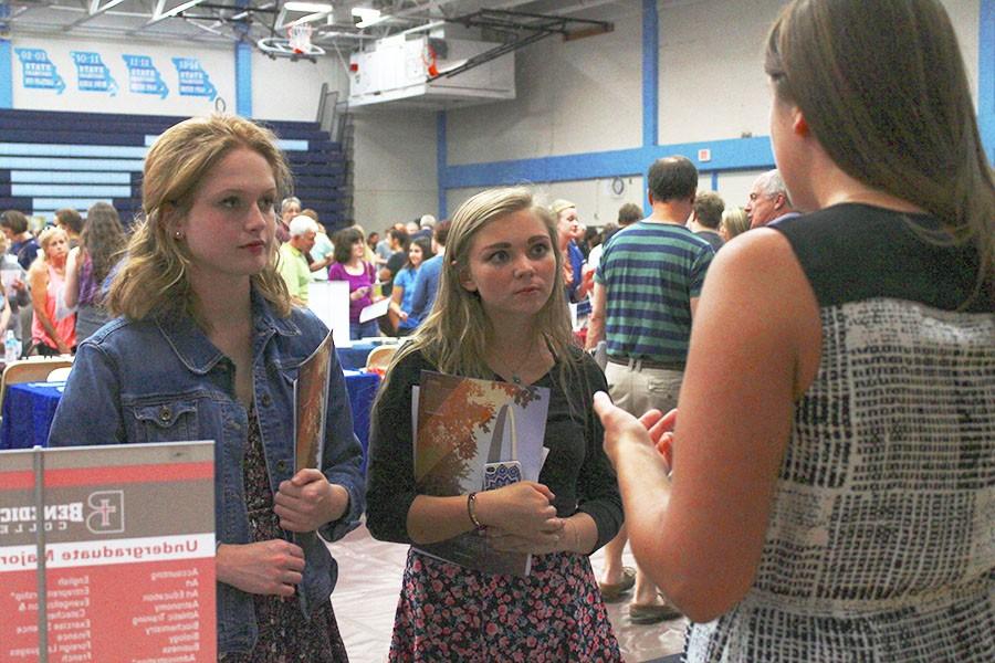 Seniors+Syndey+Baker+and+Kathryn+Harter+attend+the+college+fair+held+in+the+Parkway+West+Gymnasium+on+Sept.+15.+