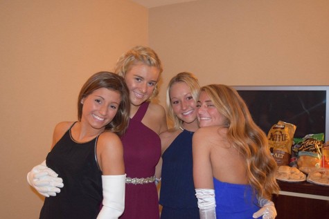 At the Veiled Prophet Ball seniors Grace Colbert, Caroline Gibbs, Maret Welby and Allie Hornbarger get ready in a hotel room before the ceremony began.