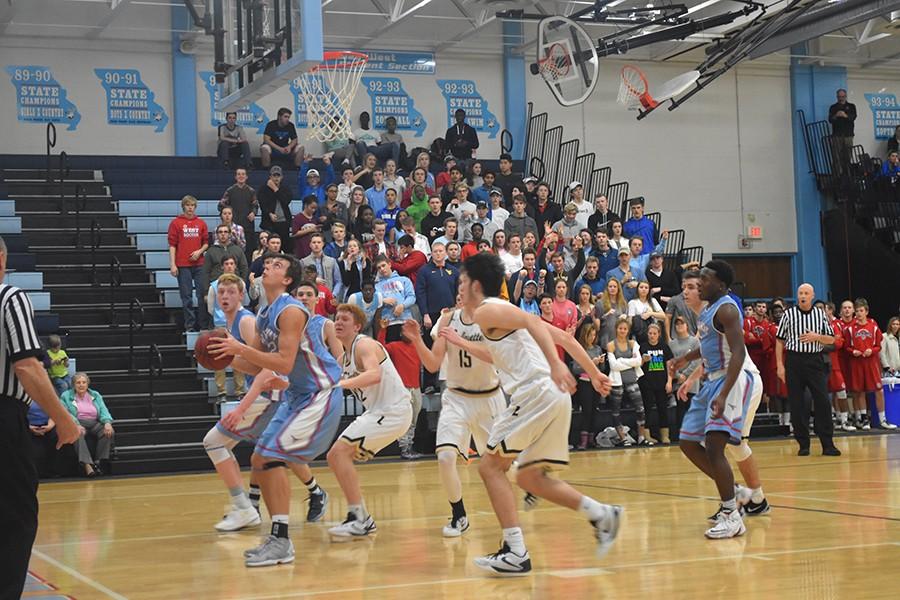 Senior Nick Lathrop grabs a rebound against Lafayette in the annual Parkway West tournament.