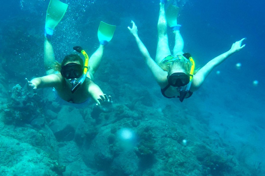 Upcoming out of country trips, like seniors Megan Barton and Corrine Schillizzis trip to the British Virgin Islands last year, will be impacted by the spreading of the Zika Virus.