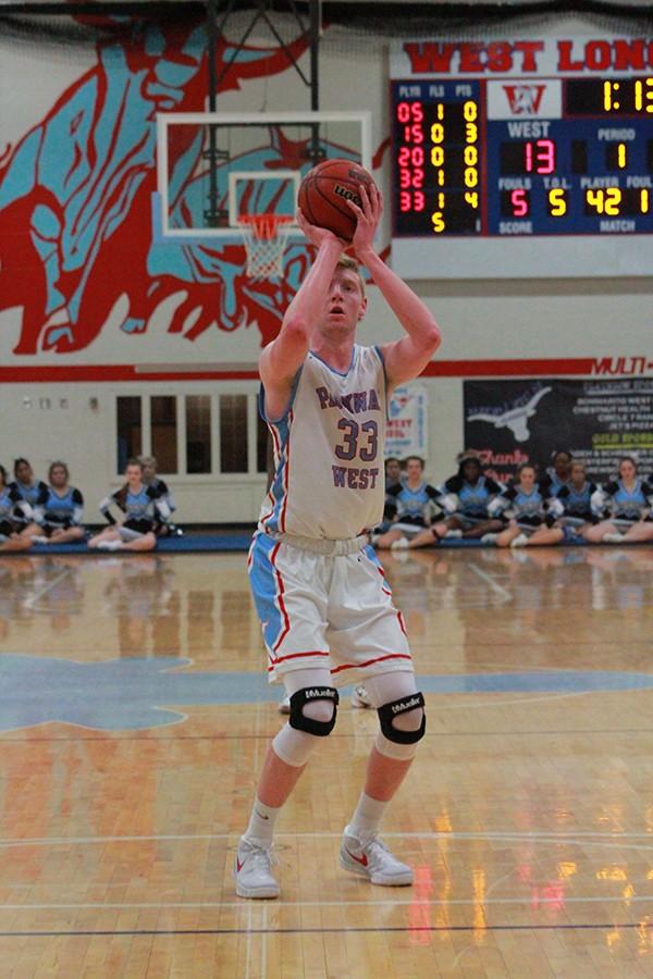 Junior Wyatt Yess spots up at the free throw line after drawing a foul. 