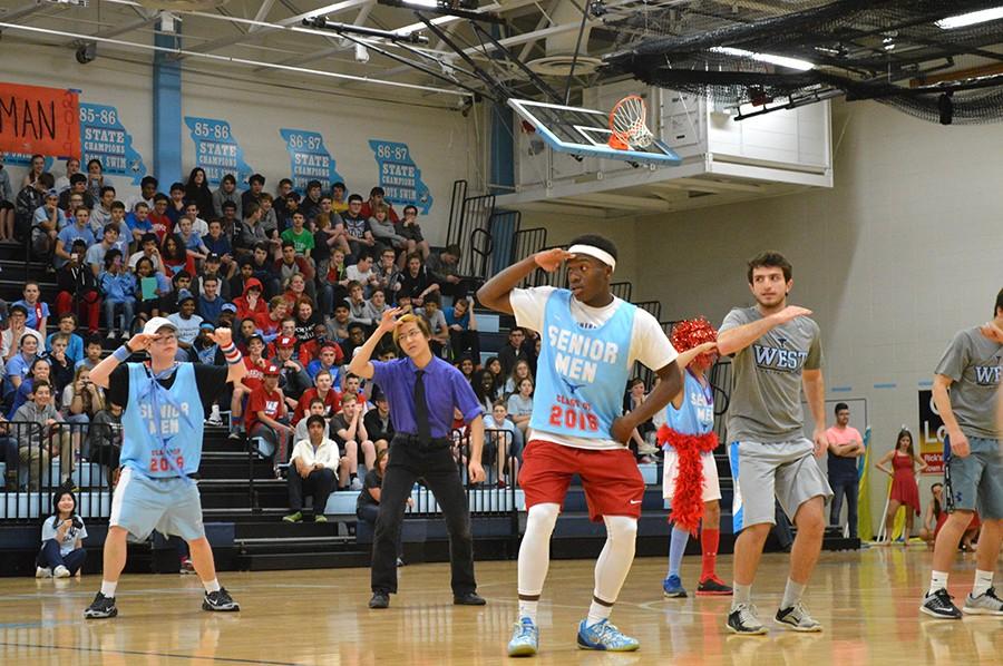 Showing off their moves, senior men perform a choreographed dance from the Mr. Longhorn pageant. “My favorite was the Stanky Leg. That is just a really fun dance for me” senior Henderson Faulkner said. The dance was set to a medley that included songs by Silento, Flo Rida and Katy Perry.
