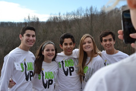 Students pose for pictures in front of a scenic lake at Camp Wyman. “My favorite part of the retreat was the bonfire on Thursday night because me and Ashlyn Roesch linked arms then proceeded to walk up to every schools cliques and introduce ourselves, and that was super duper fun and it was a great platform for us to build relationships off of the following day.” freshman class president Ethan Golde said.