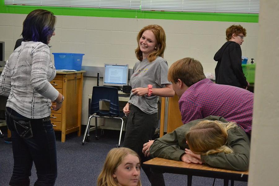 Students talk during a Fun-Size Film meeting.